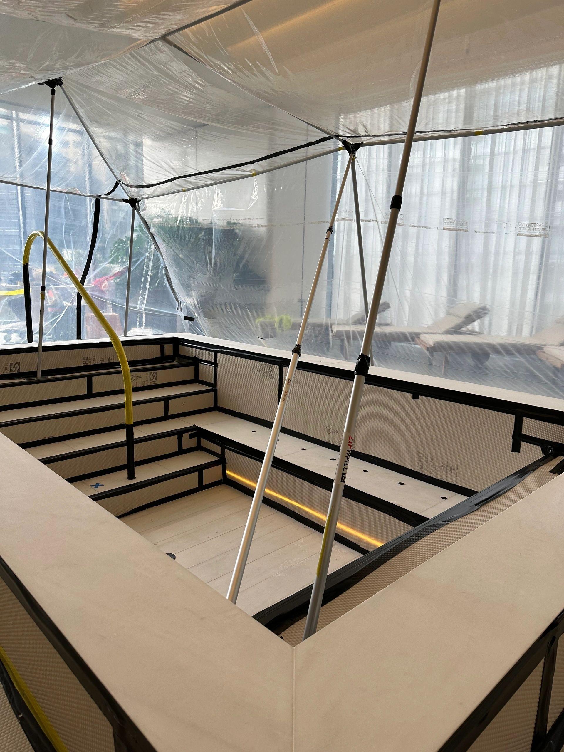 An occupied fit-out sealed under M&M containment and protection