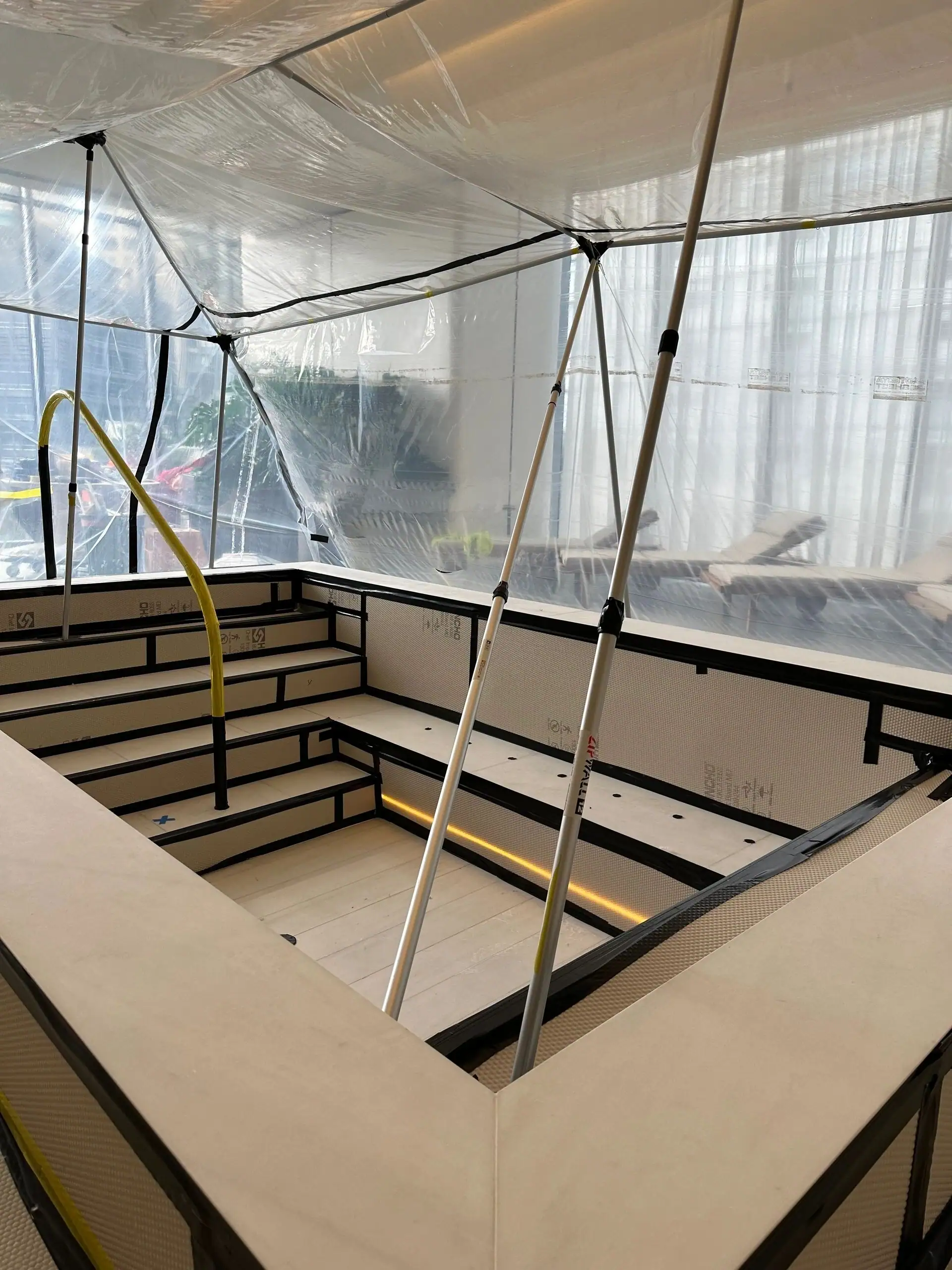 An occupied fit-out sealed under M&M containment and protection